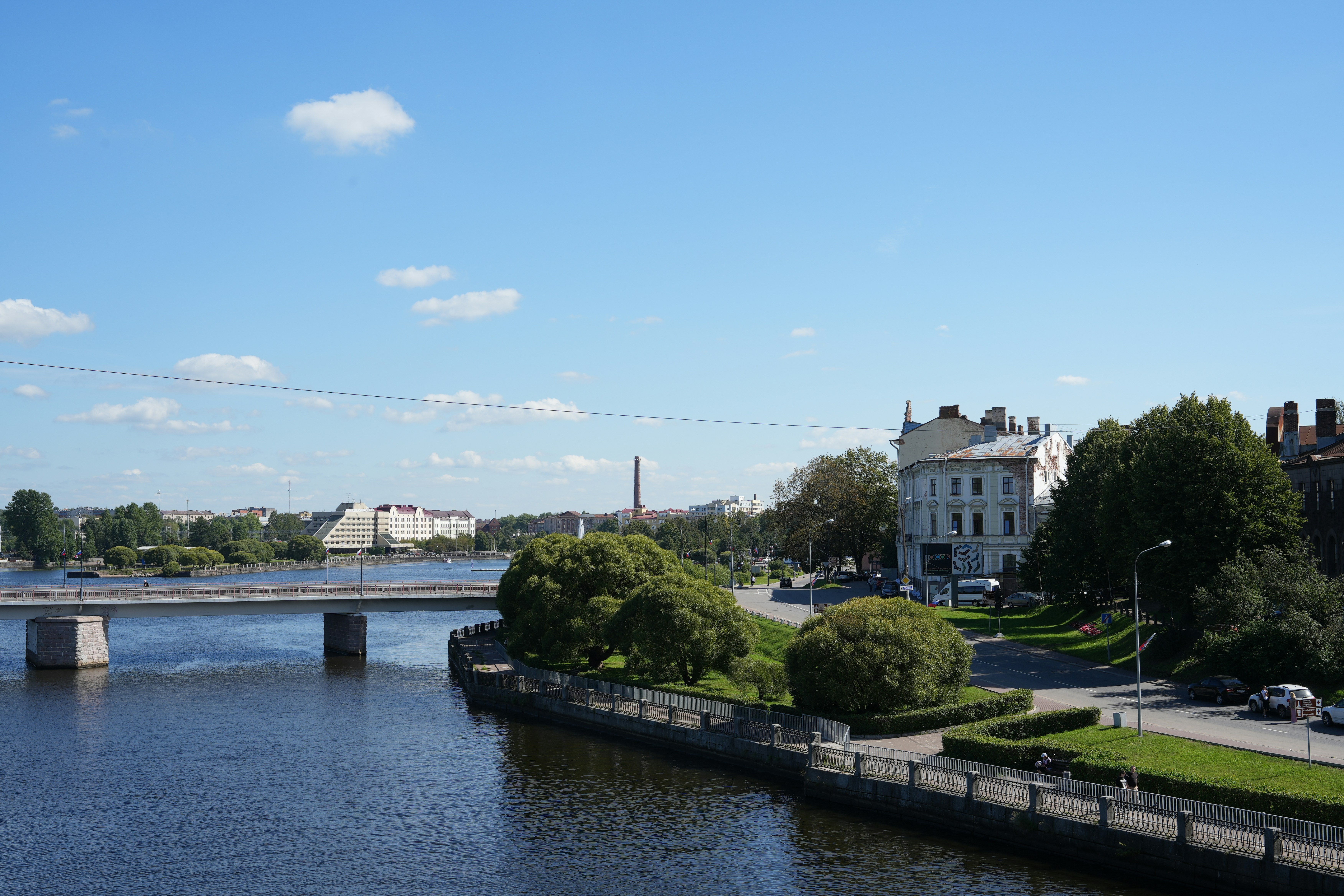A river running through a city next to a bridge