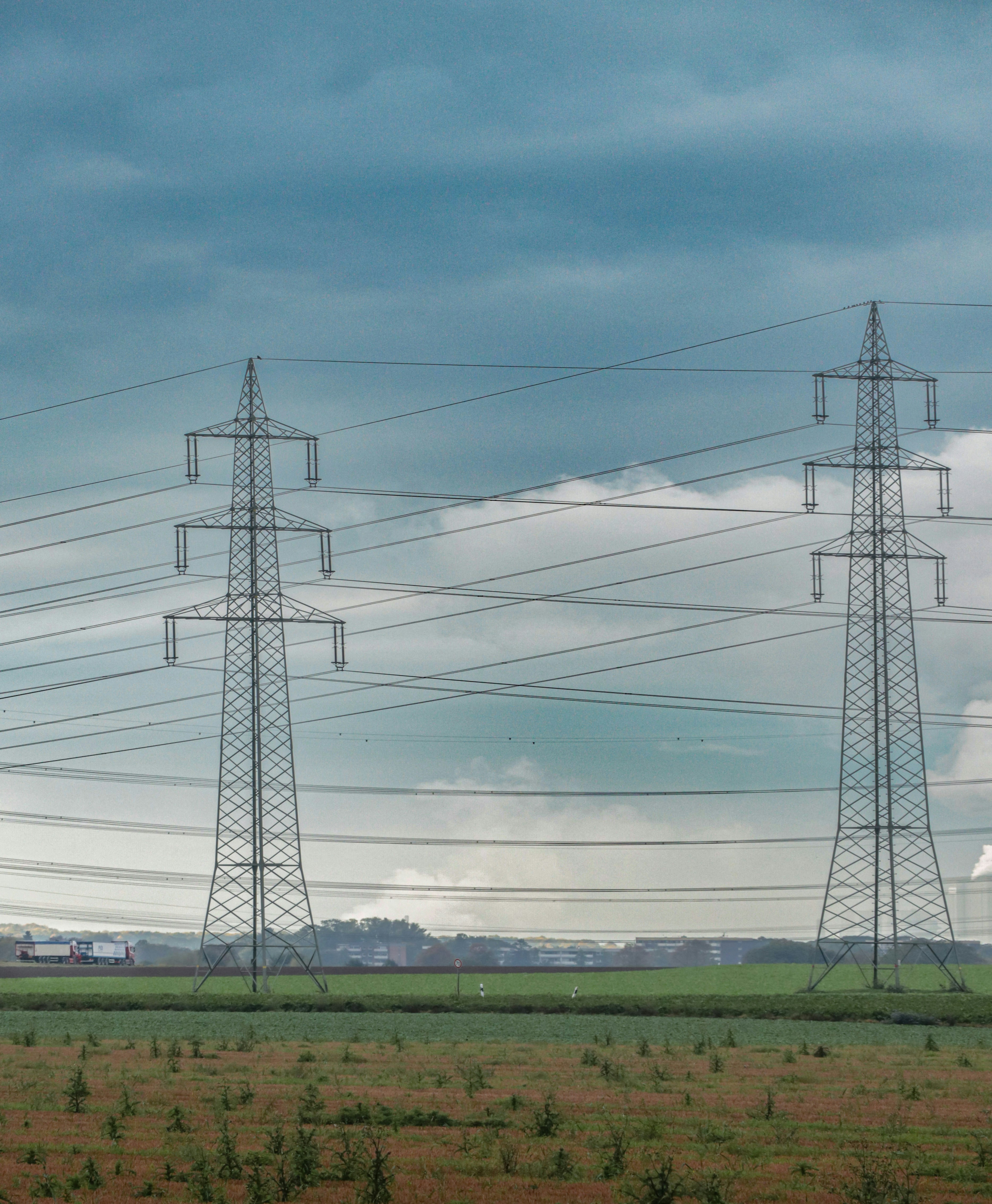 A field with power lines in the distance
