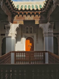 A building with a door and a balcony