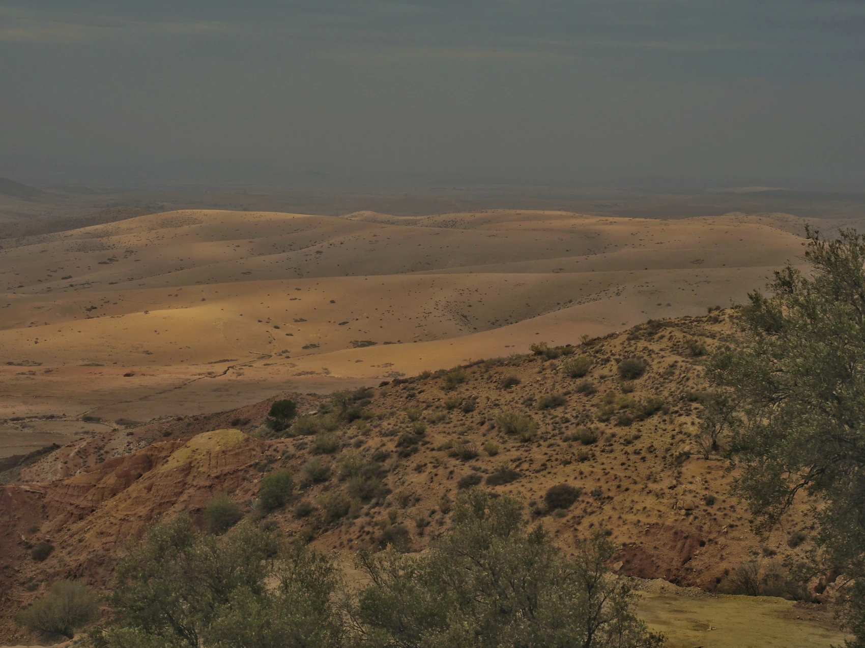 The stony Agafay landscape extending towards the Atlas Mountains near Marrakech