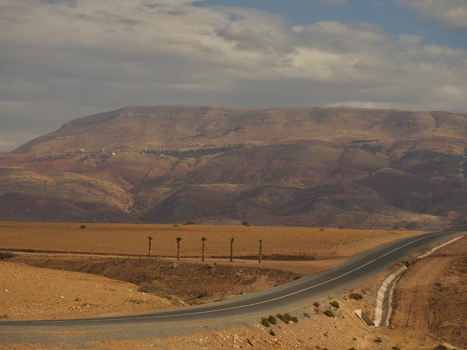 Open road through the Moroccan plains