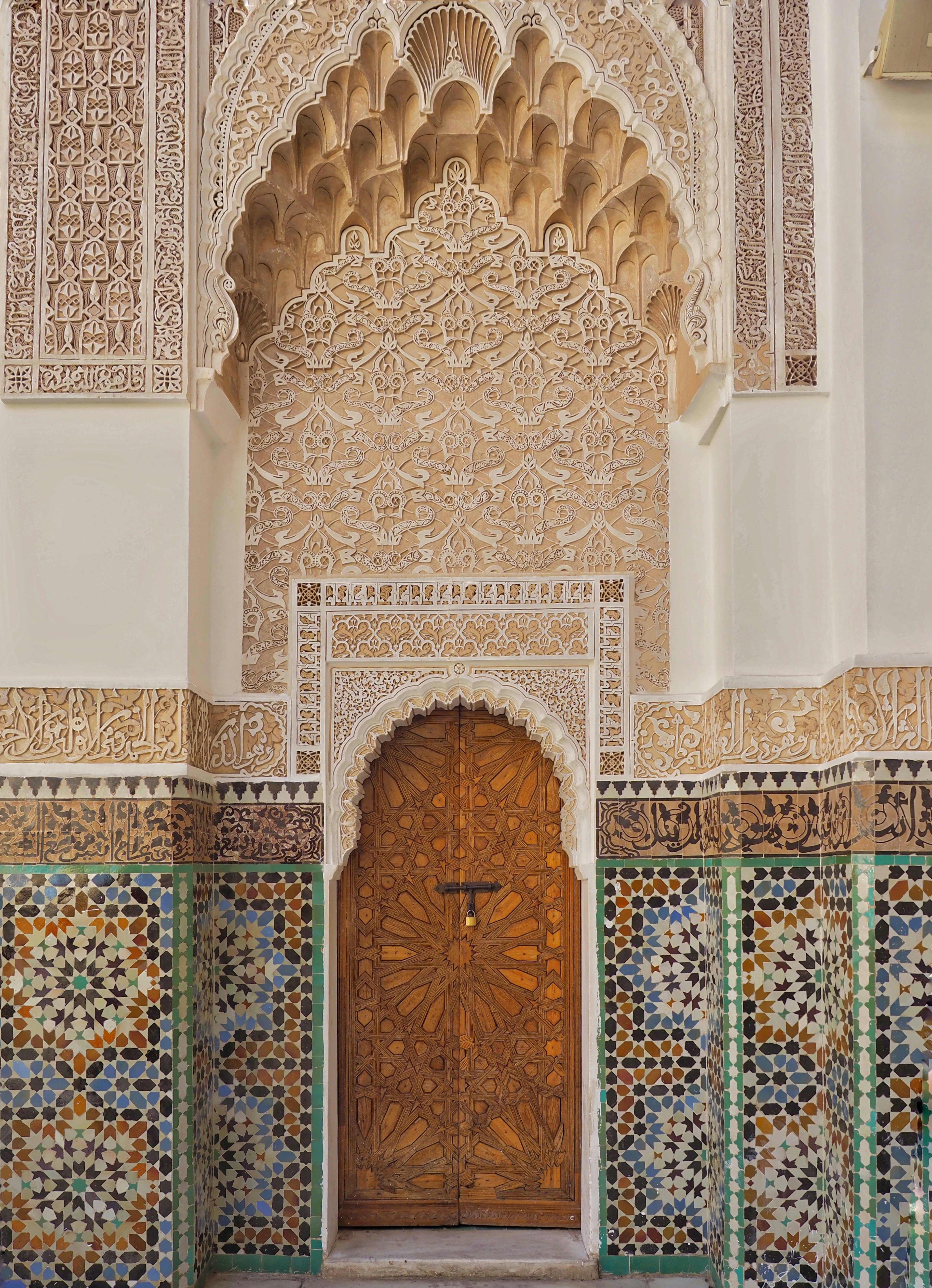 A doorway in a building with a clock on the wall