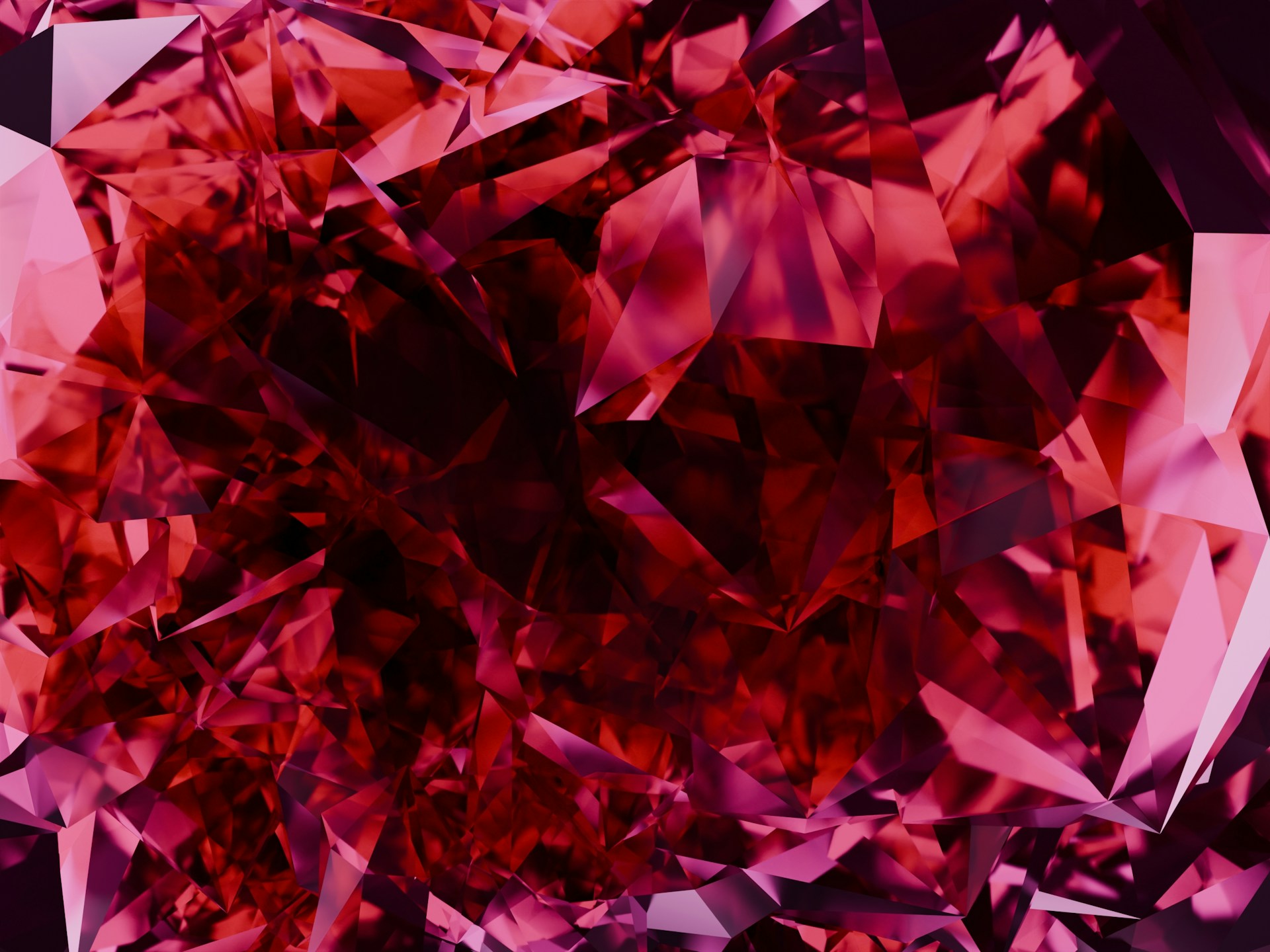 A close up of a pink diamond on a purple background