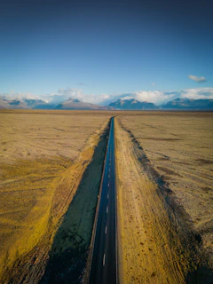 An aerial view of a road in the middle of nowhere