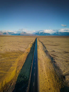 An aerial view of a road in the middle of nowhere