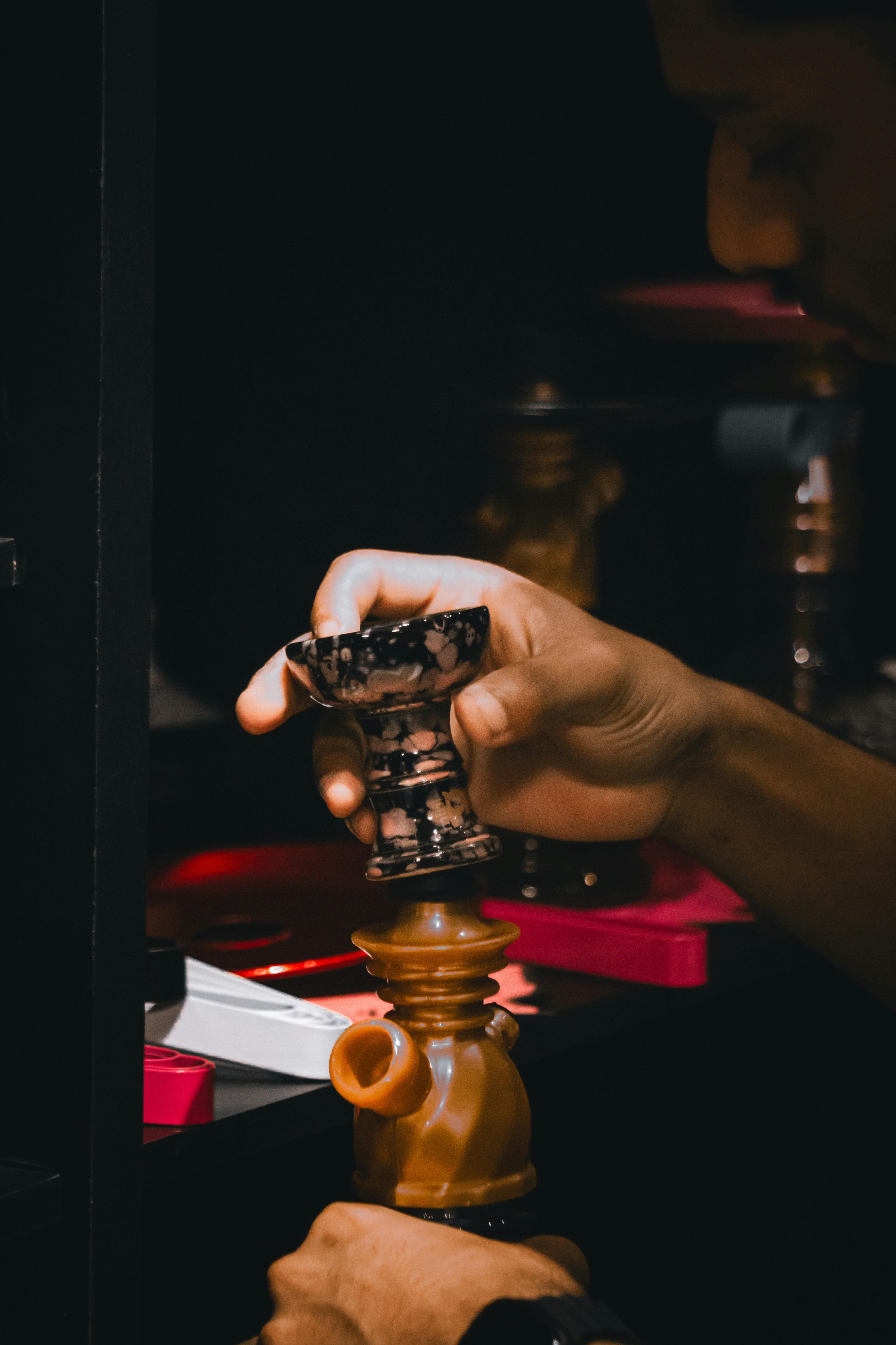 A person holding a lighter in their hand