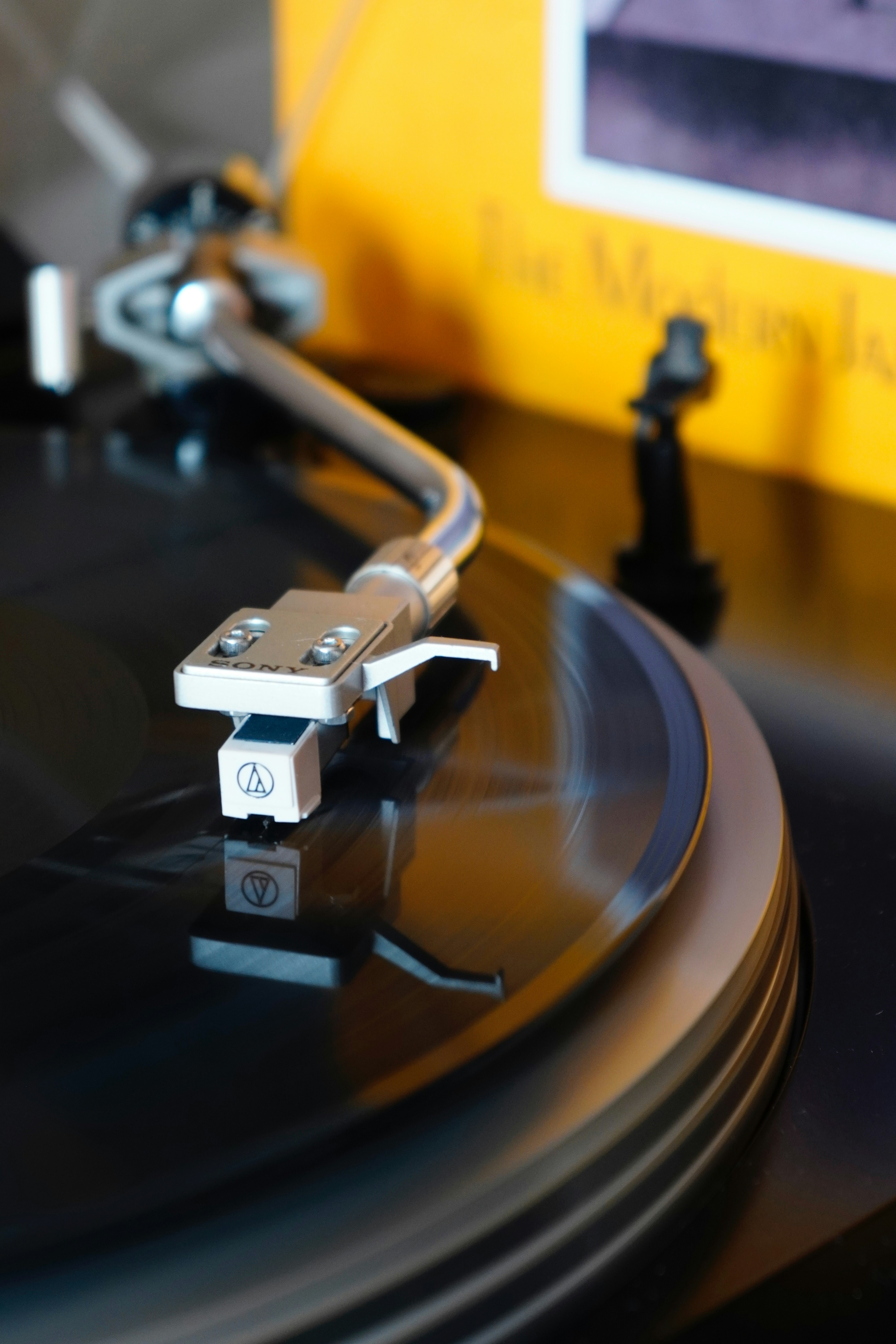 A close up of a record player on a table