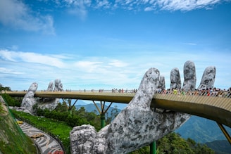 A bridge that has people walking across it