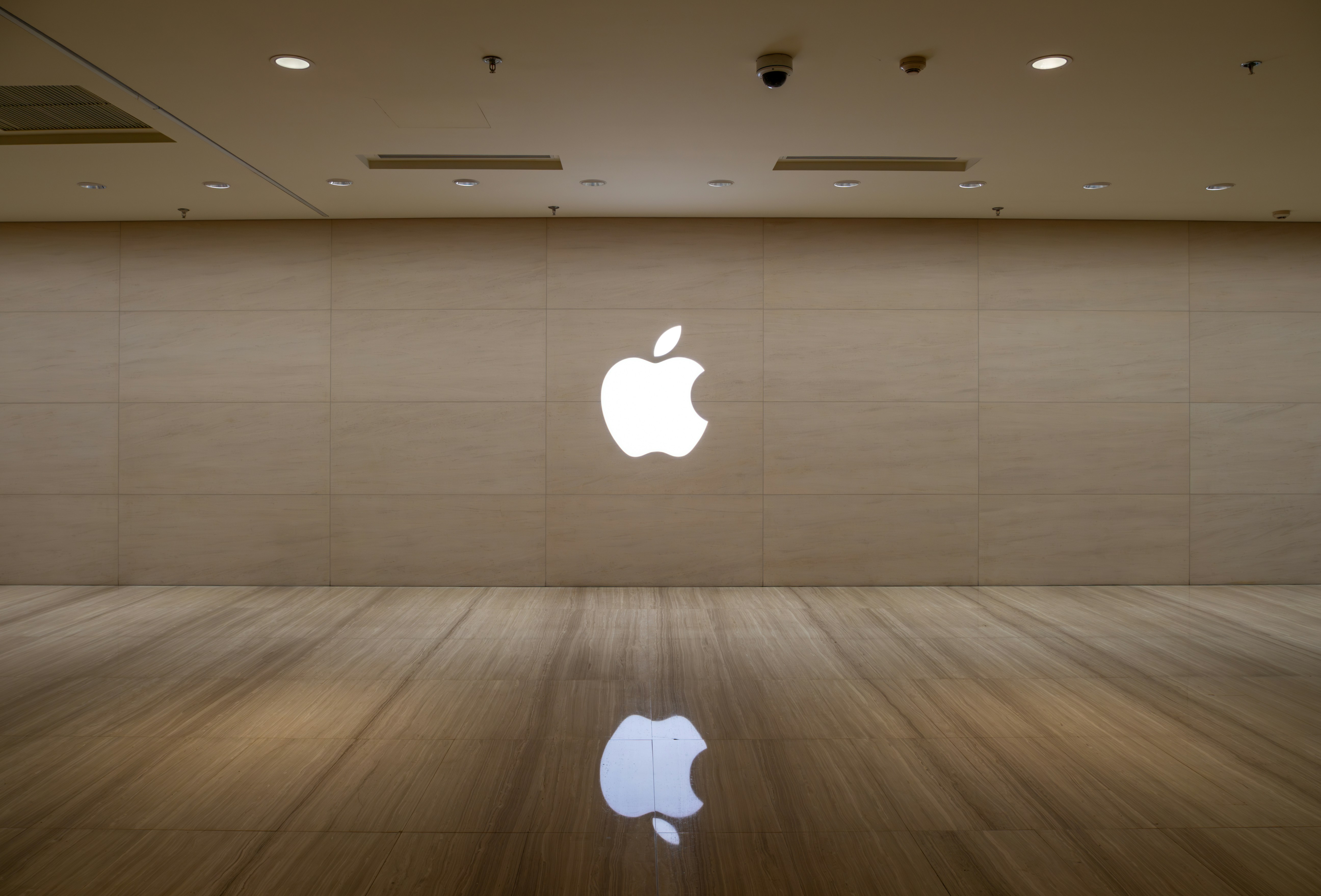 An image of an apple logo on a wall