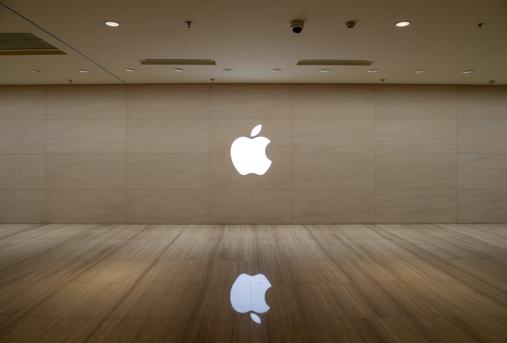 An image of an apple logo on a wall