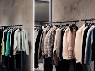 A rack of shirts and pants in a store