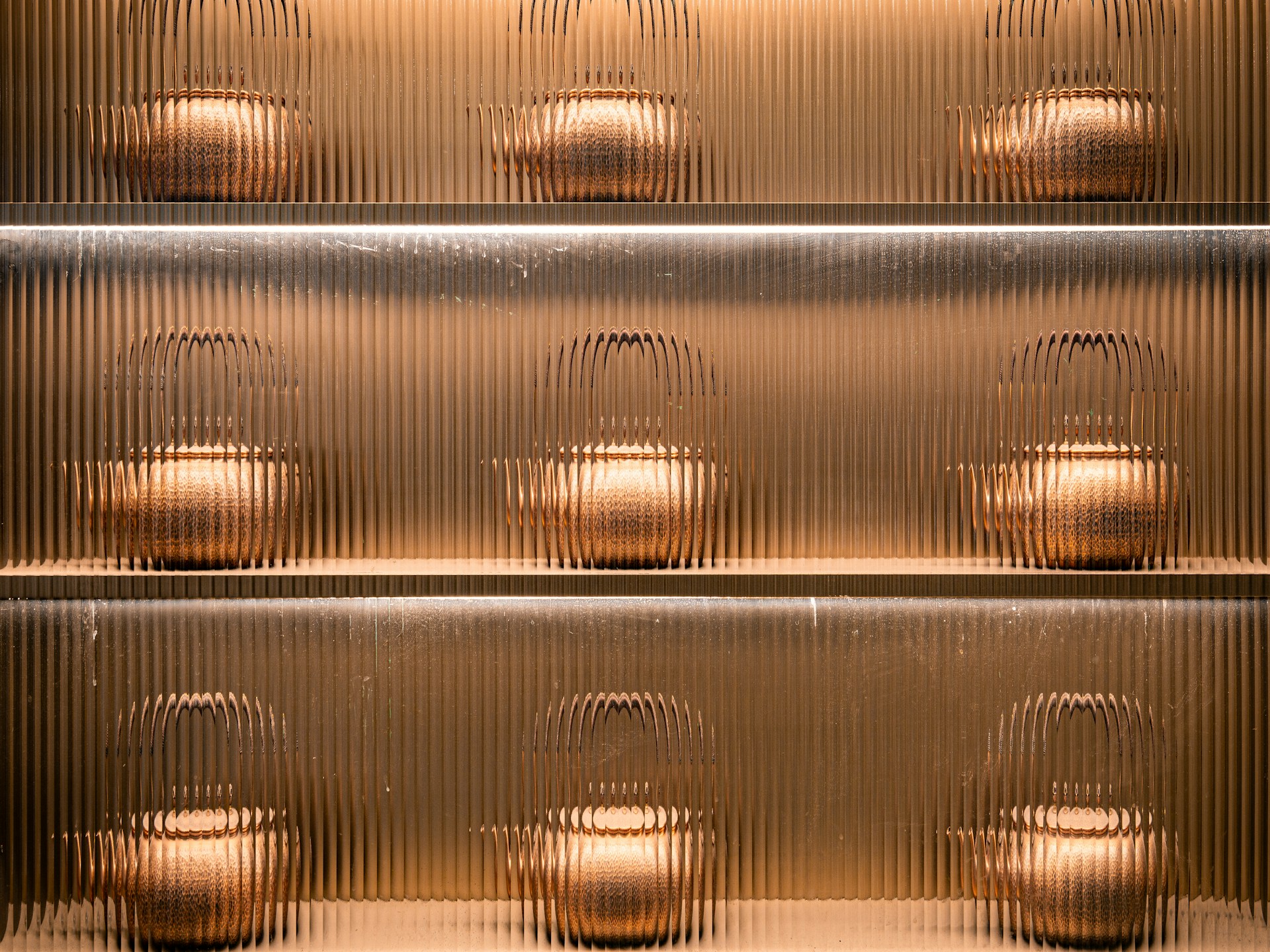 A metal shelf filled with lots of pots