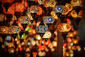A bunch of lights that are hanging in a room