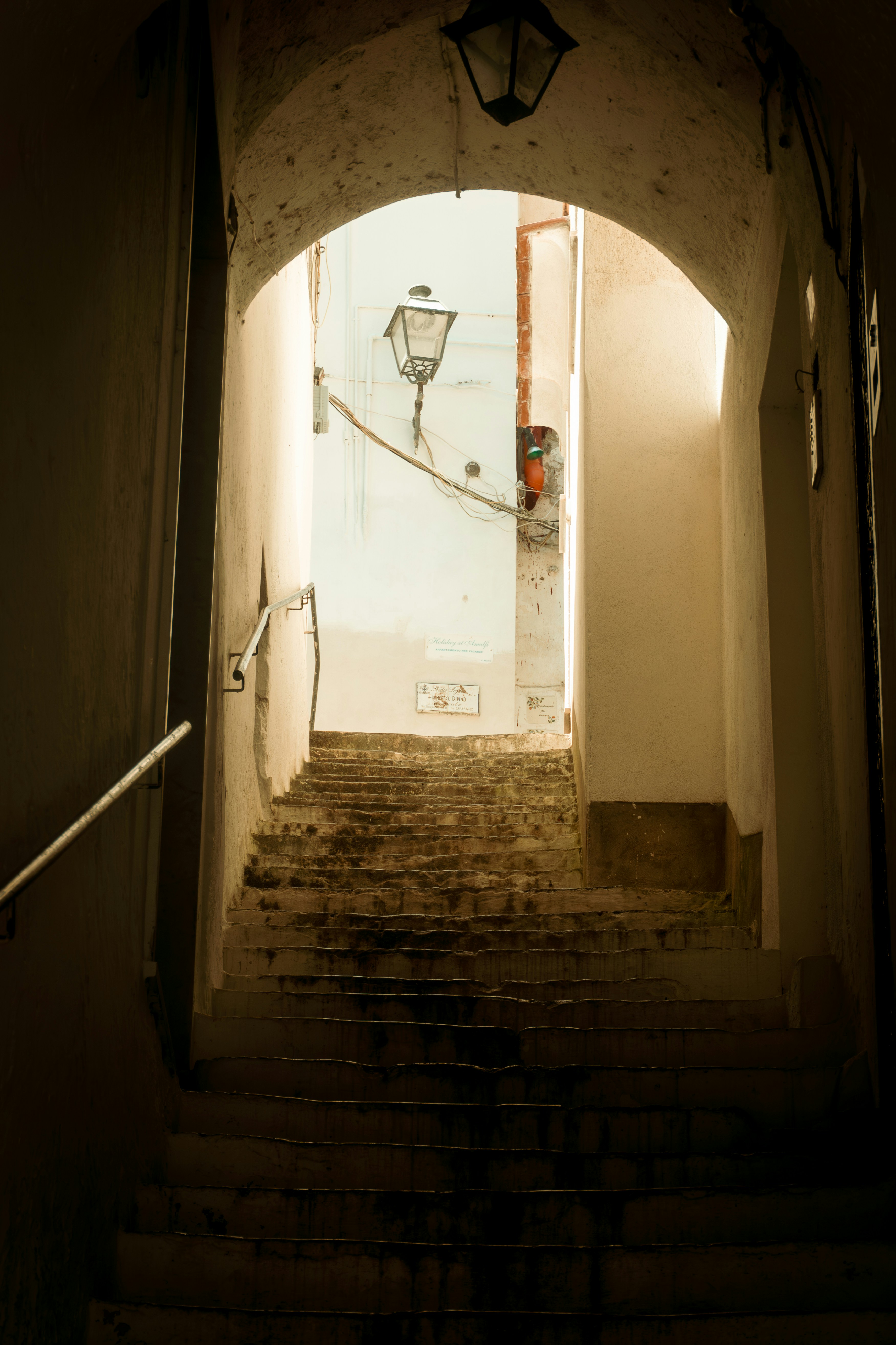 A set of stairs leading up to a light