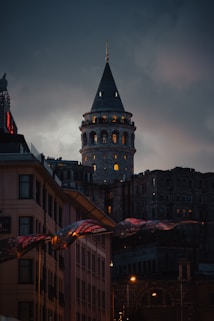 A very tall building with a clock on it's side