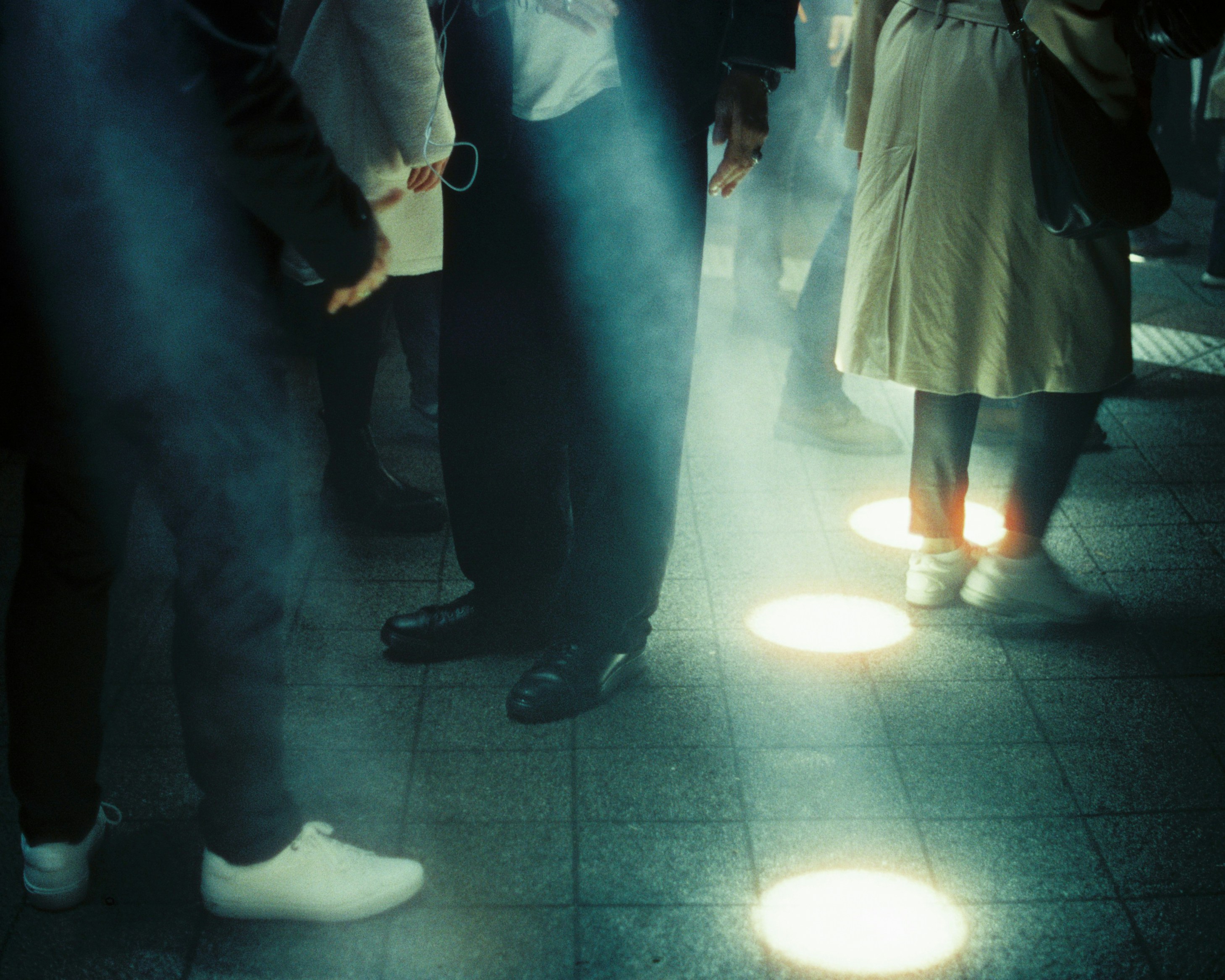 A group of people standing next to each other