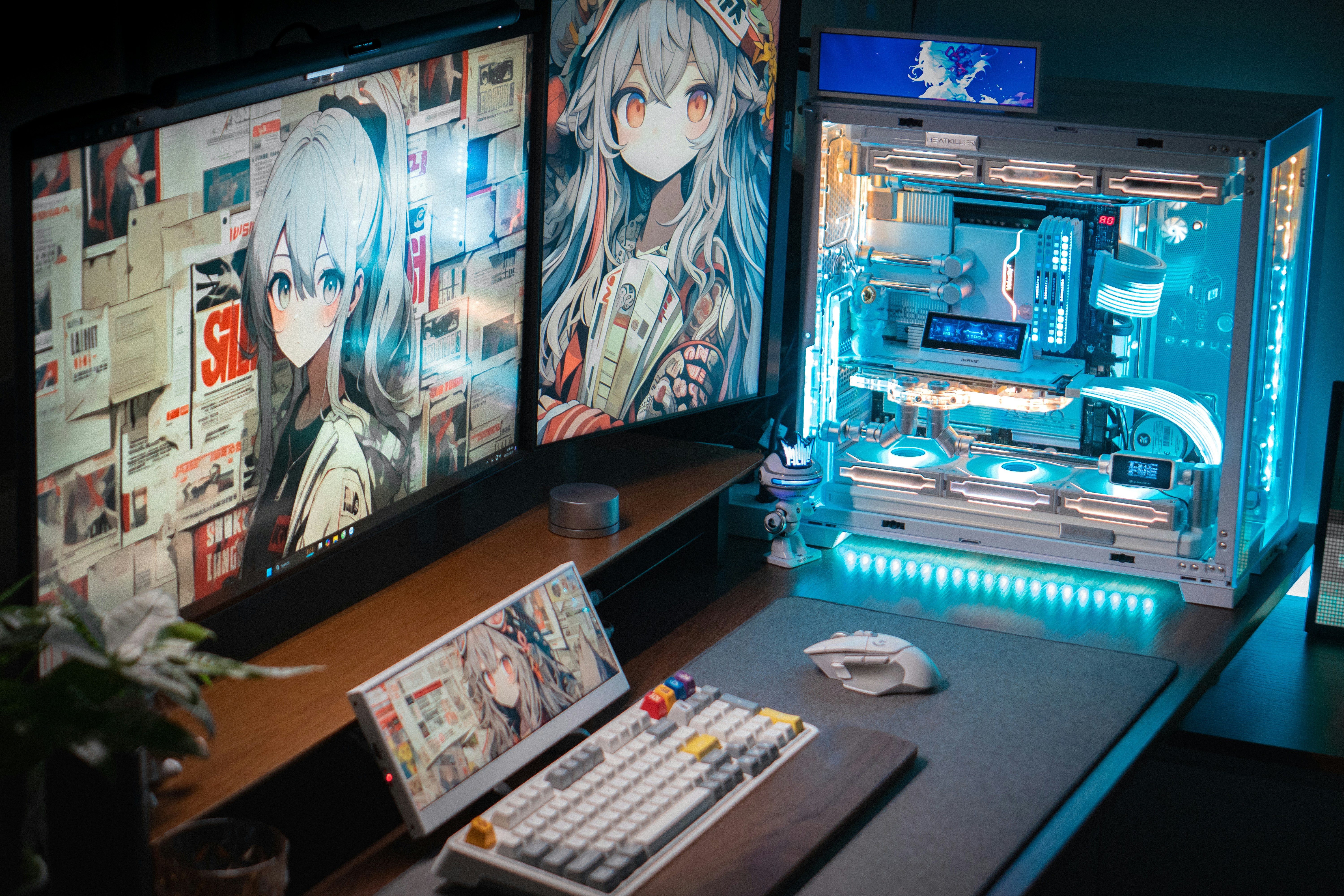 A desk with a computer and a bunch of pictures on it
