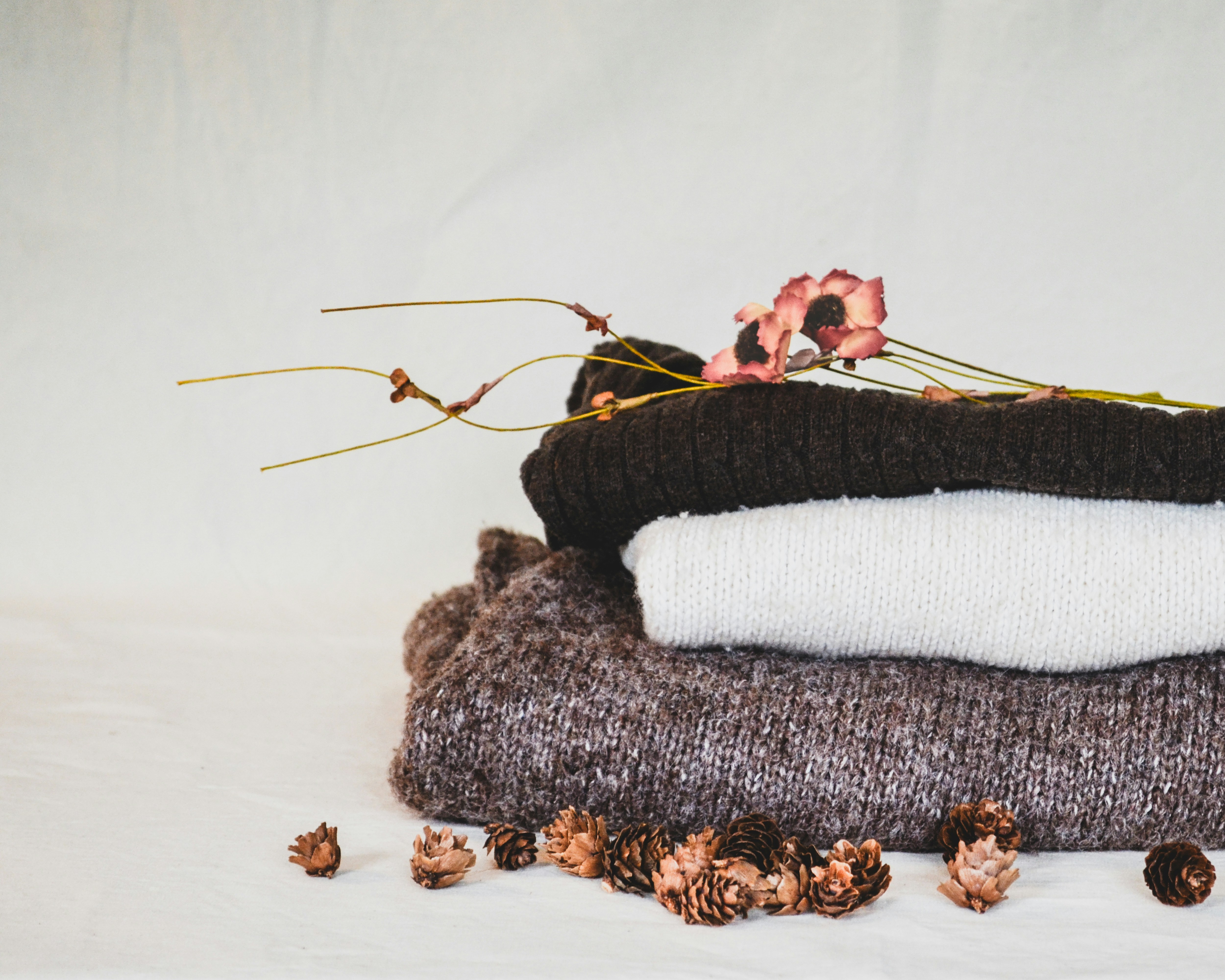 A pile of blankets sitting on top of each other