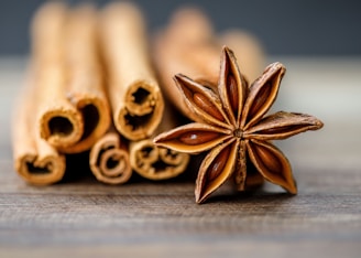 Cinnamon sticks and star anise on a wooden table