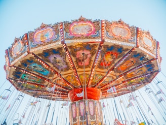 A carnival ride with people riding on it