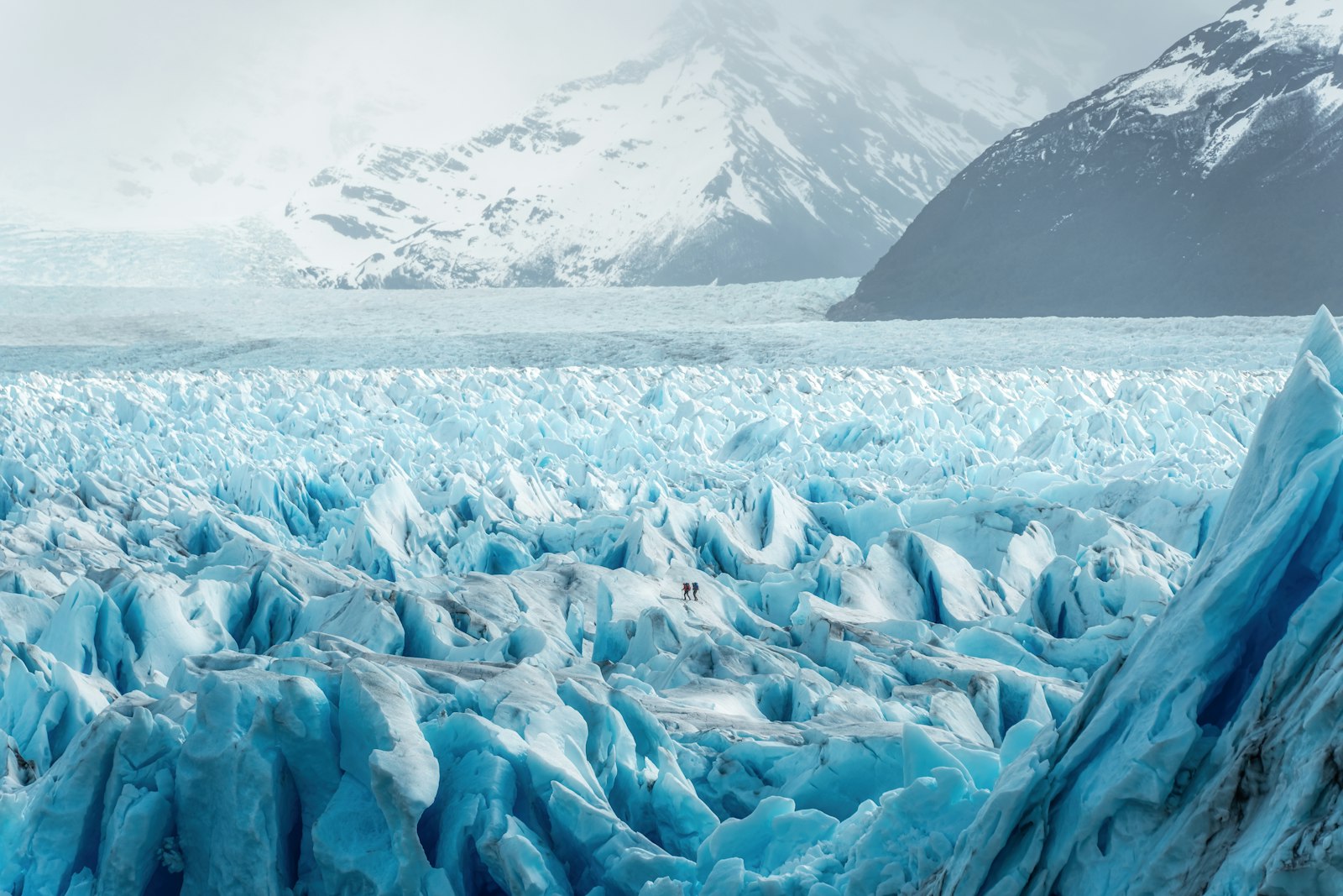 Ice fields stretching to the mountains — the glacial forces that shape Patagonian hazard patterns