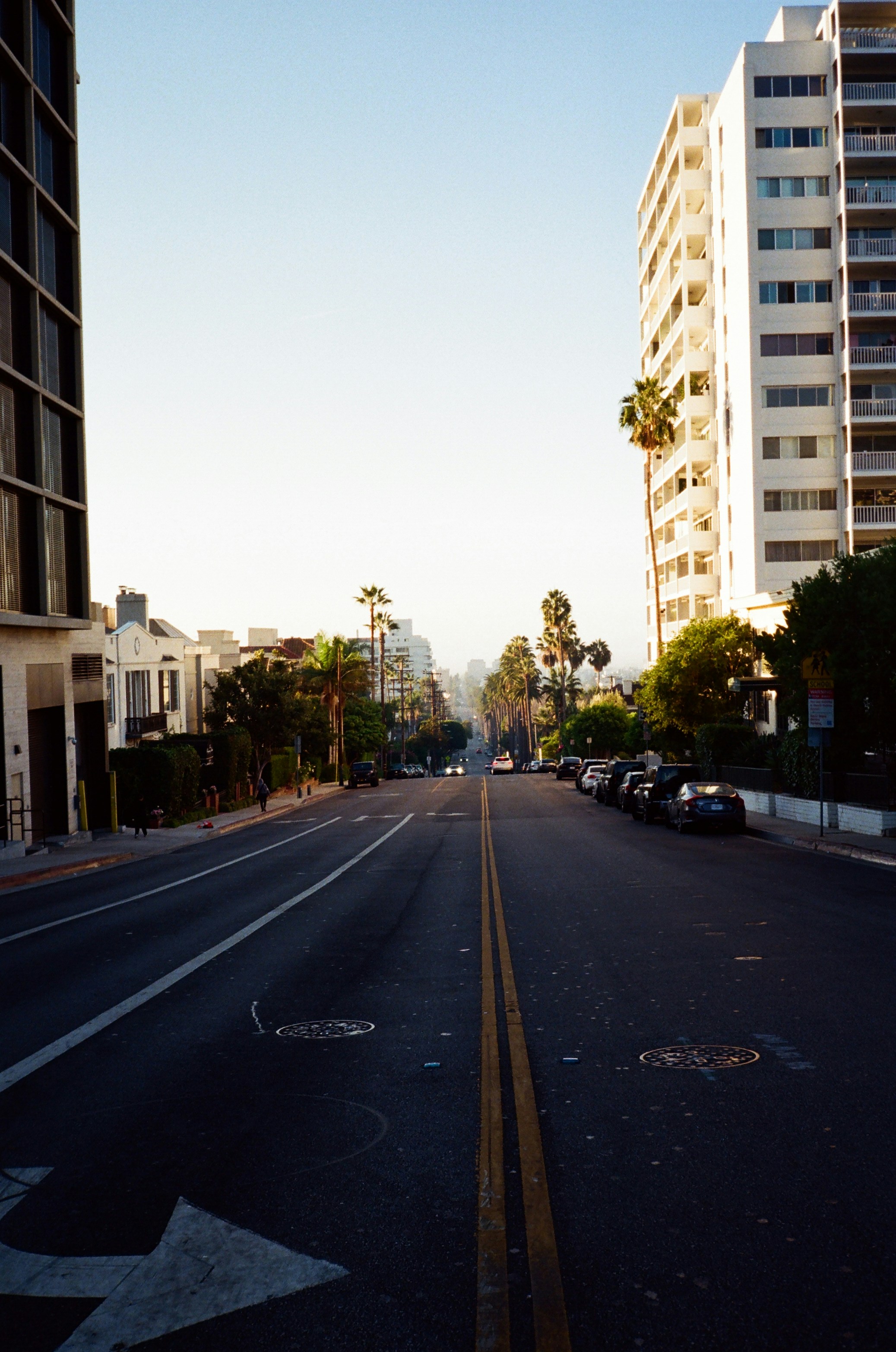 An empty street with a star painted on the road