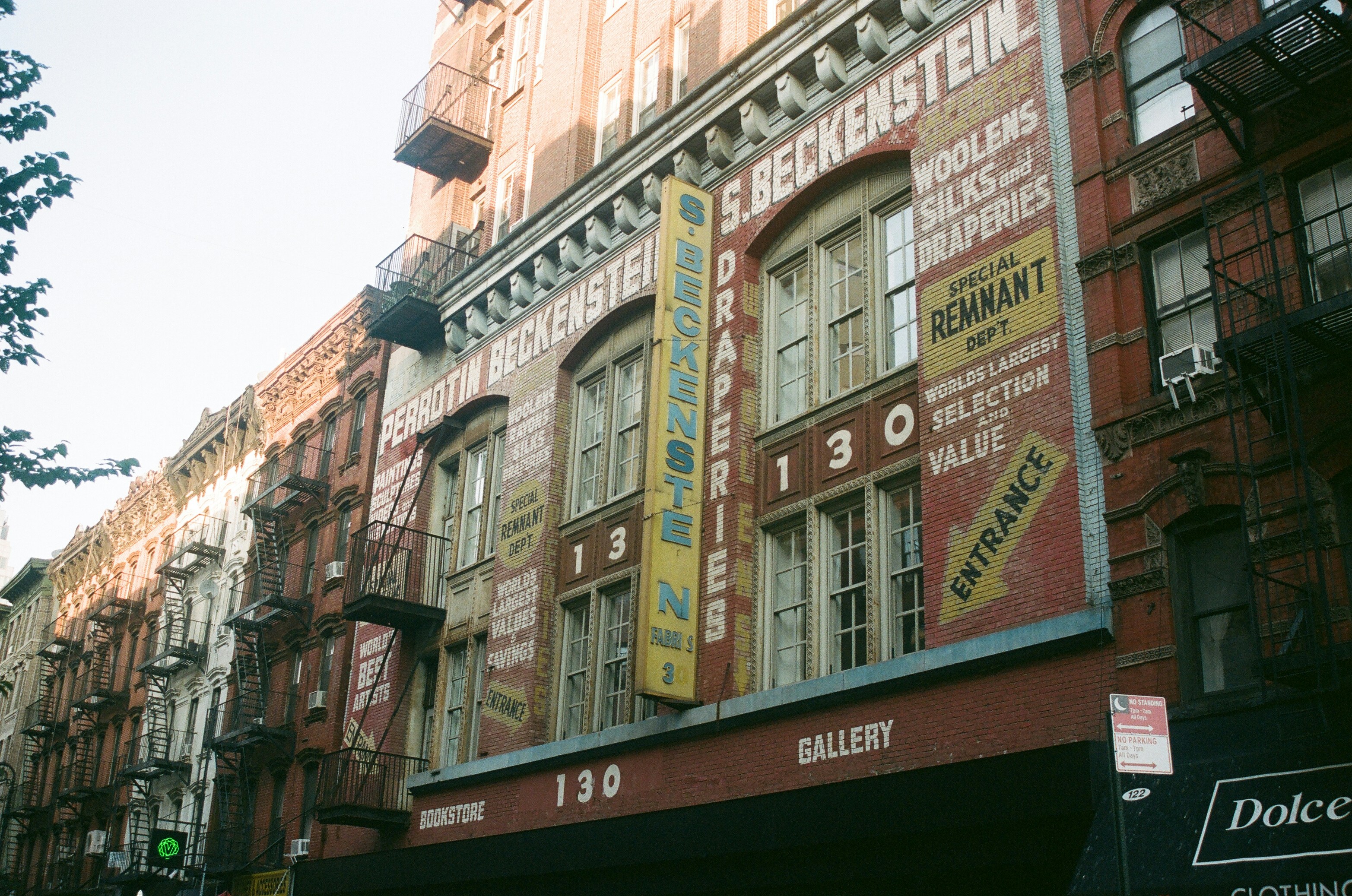 A building with a lot of signs on the side of it