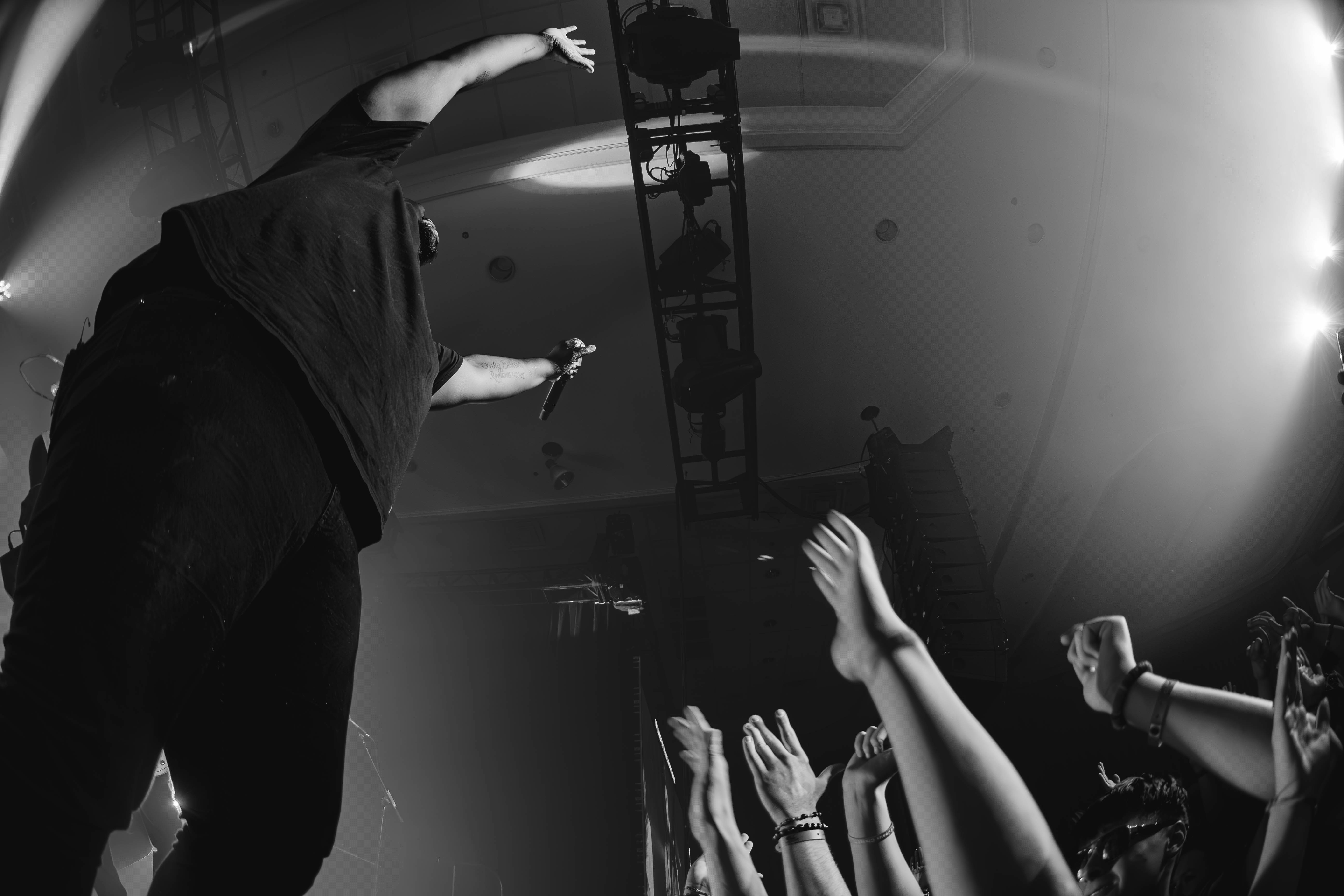 A group of people standing on top of a stage