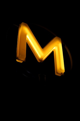 The letter m is lit up in the dark