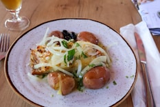 A plate of food on a wooden table