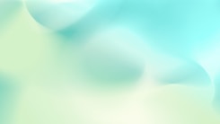 A blurry image of a blue and green background