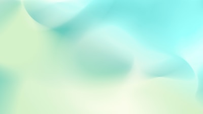 A blurry image of a blue and green background