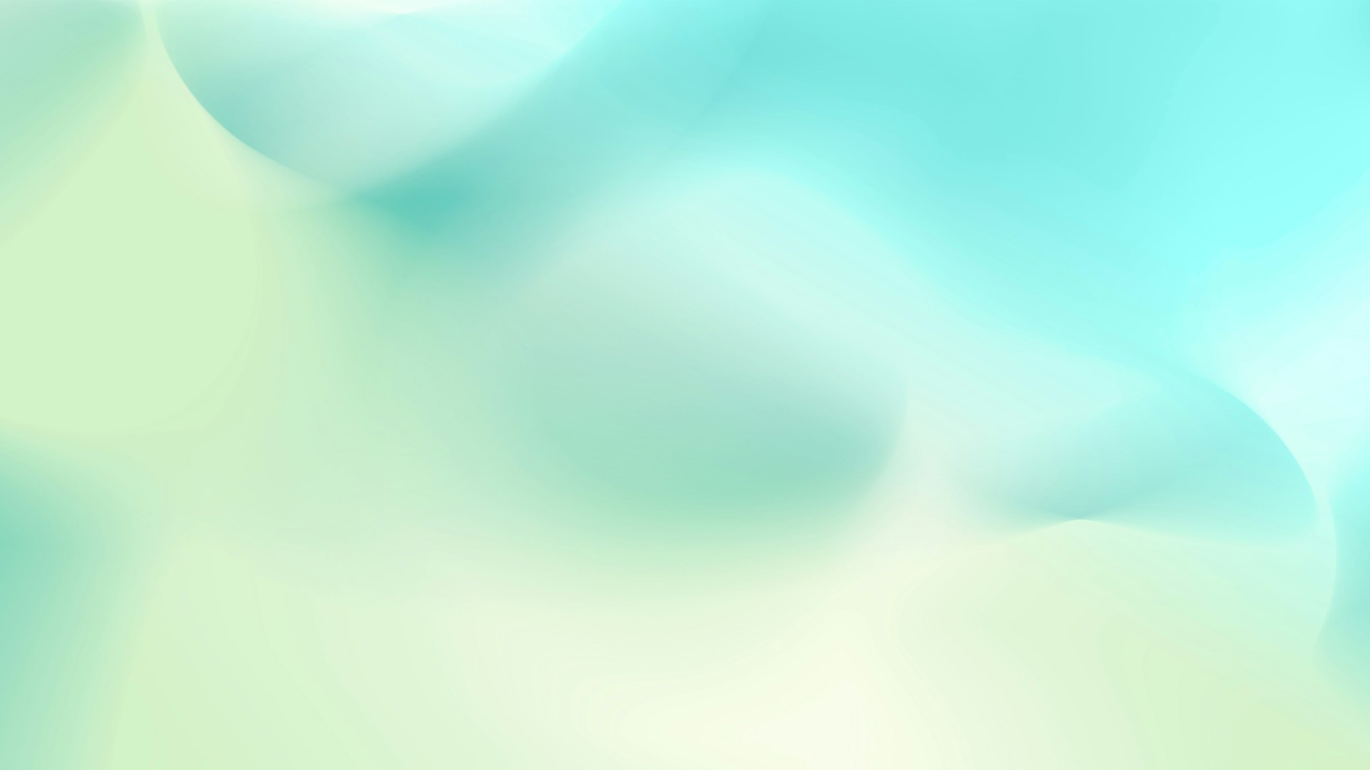 A blurry image of a blue and green background