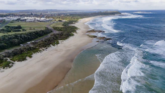 An aerial view of a beach and ocean