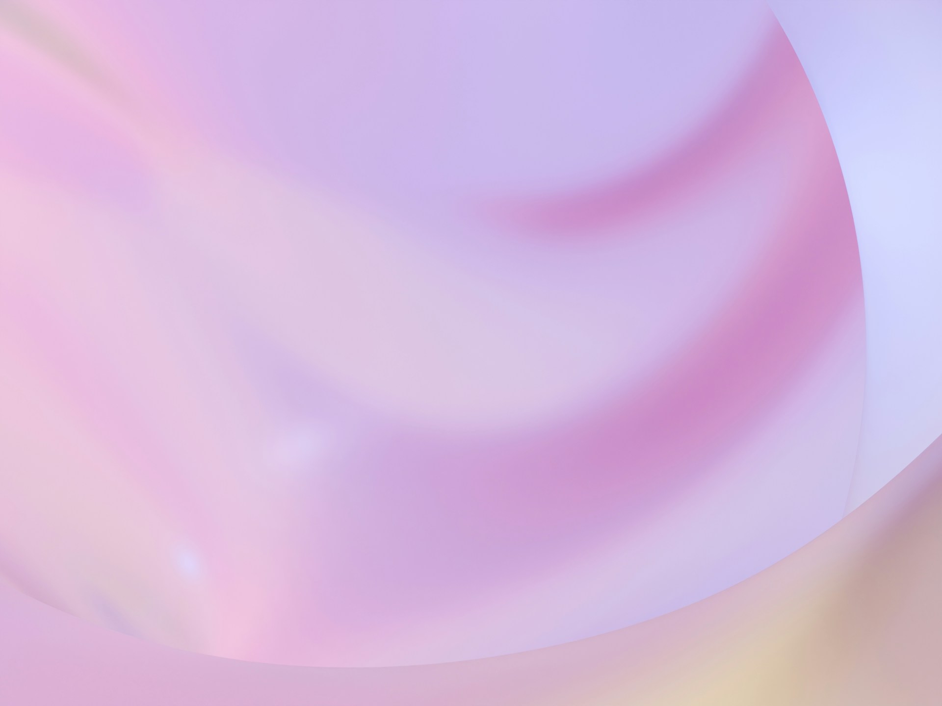 A blurry image of a pink and yellow background