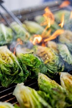 A close up of food cooking on a grill