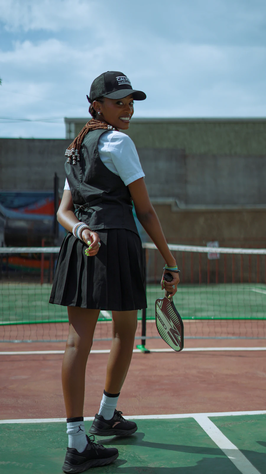 Woman on tennis court