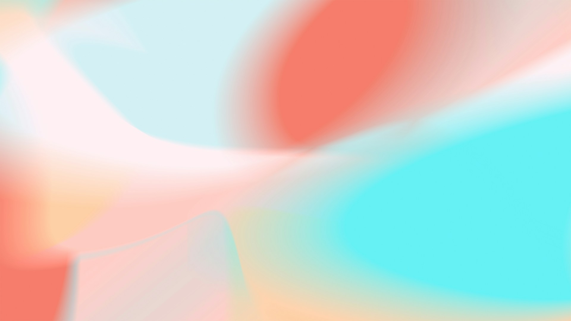 A blurry image of a pink and blue background