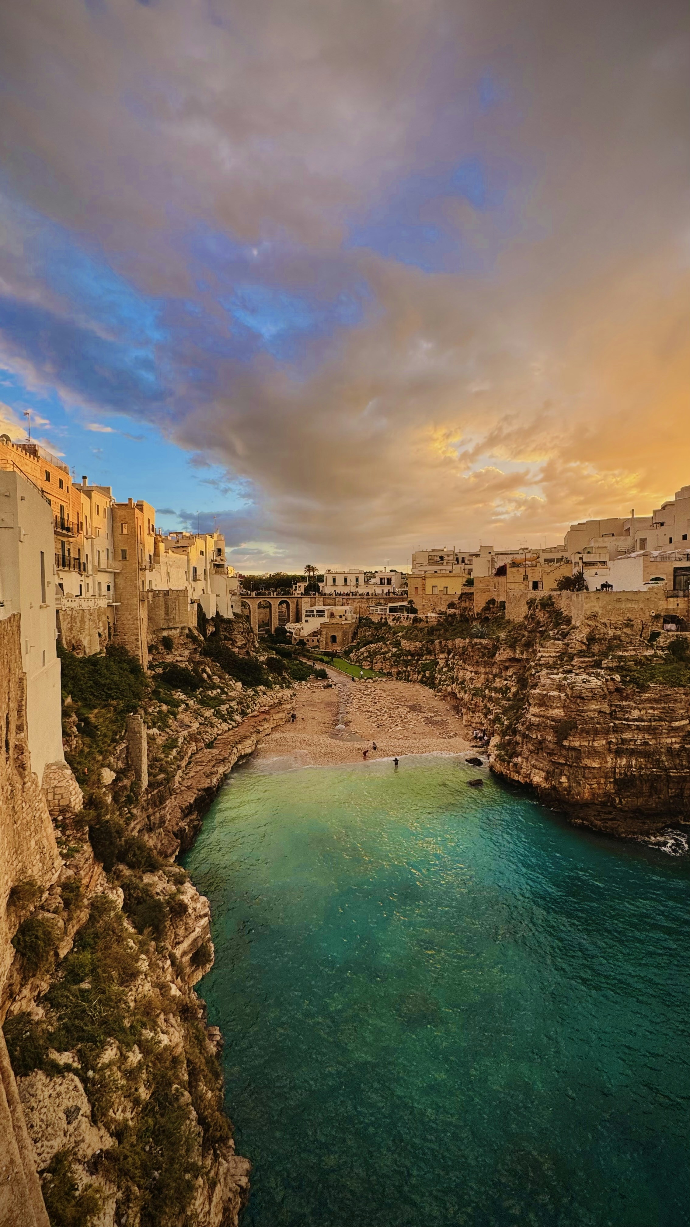 A river running through a canyon next to a cliff