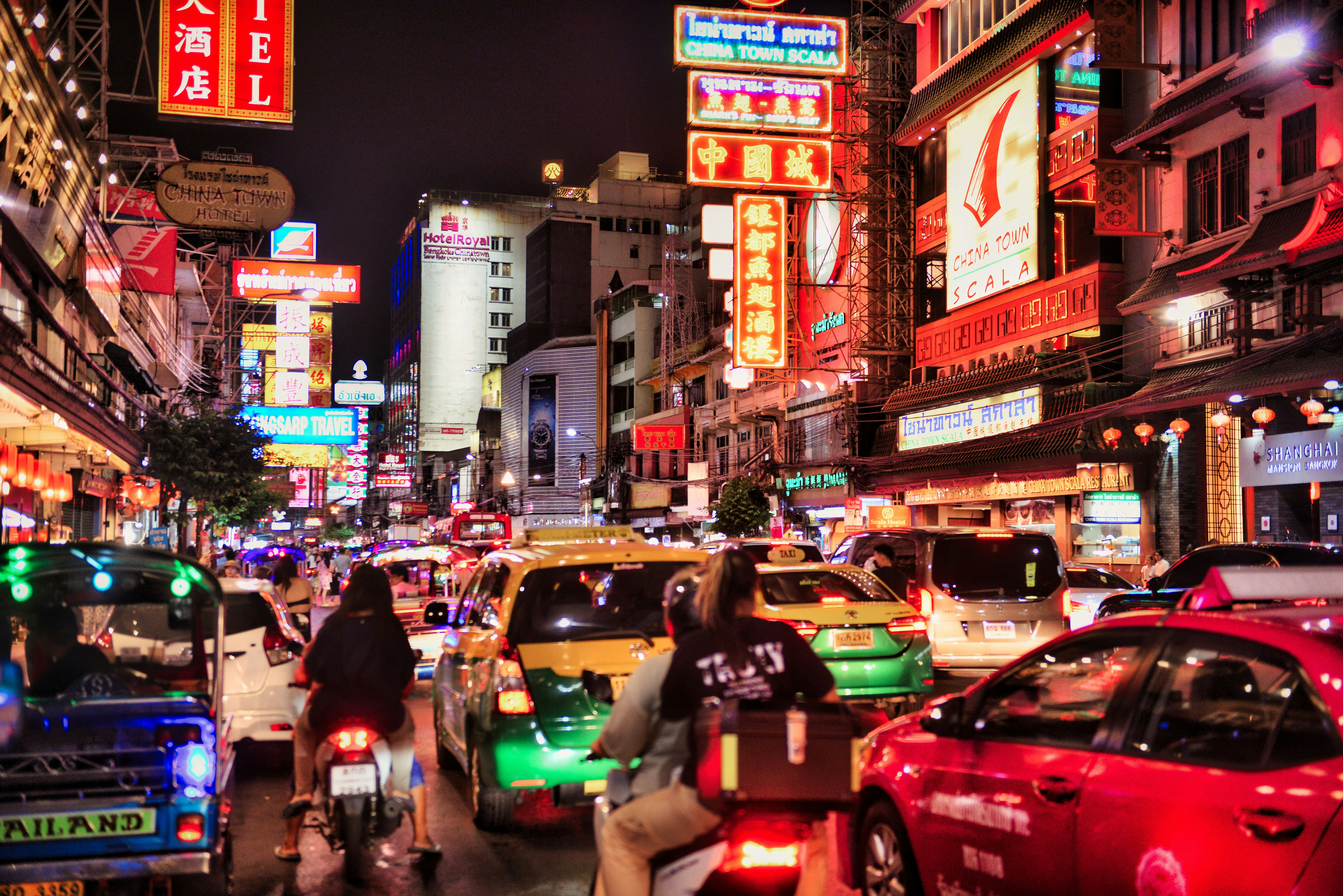 A busy city street filled with lots of traffic