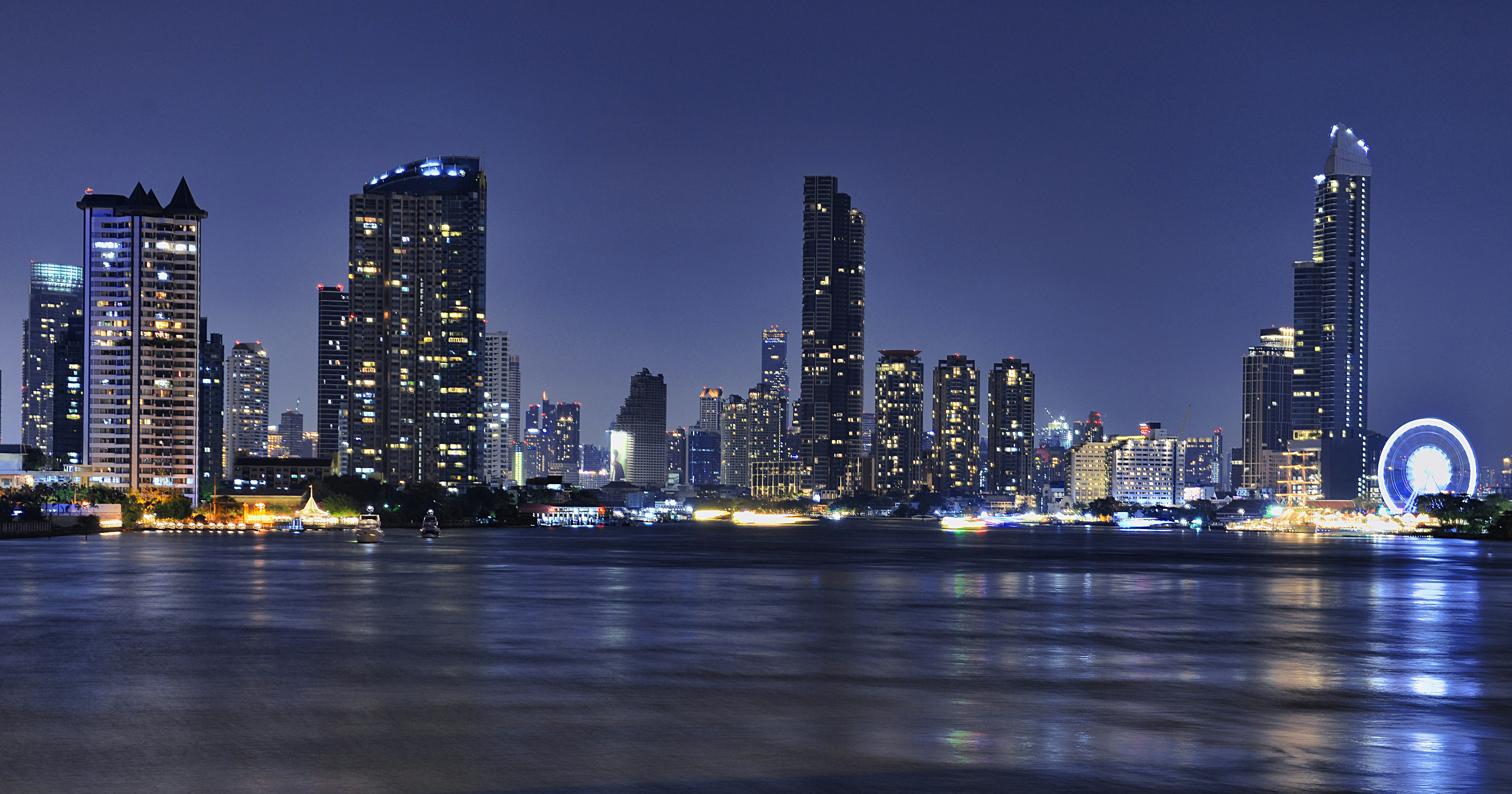 A view of a city at night from across the water