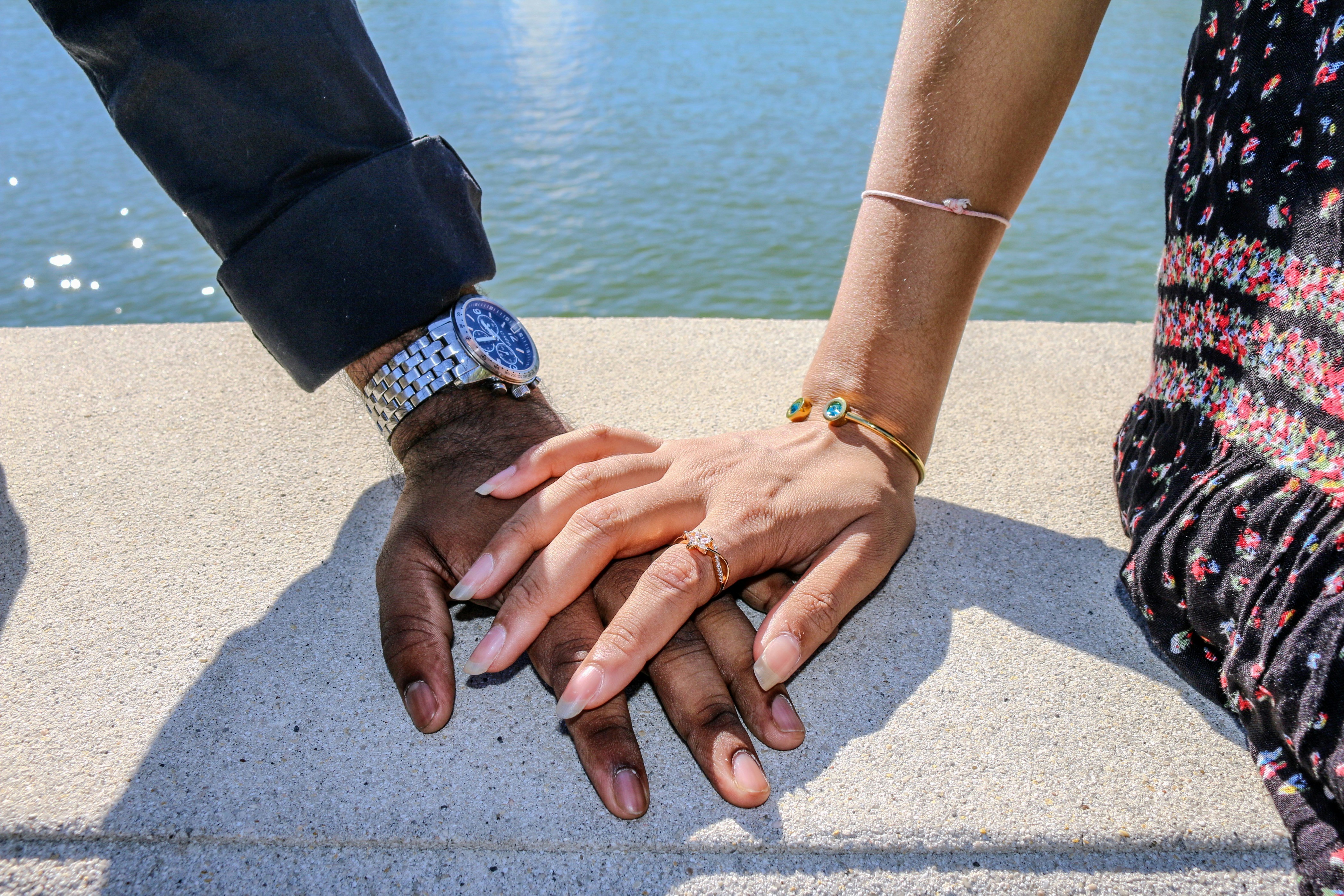 Hands connect above a stylized digital retail graph, representing strategic mergers, acquisitions, and initial public offerings shaping the industry.