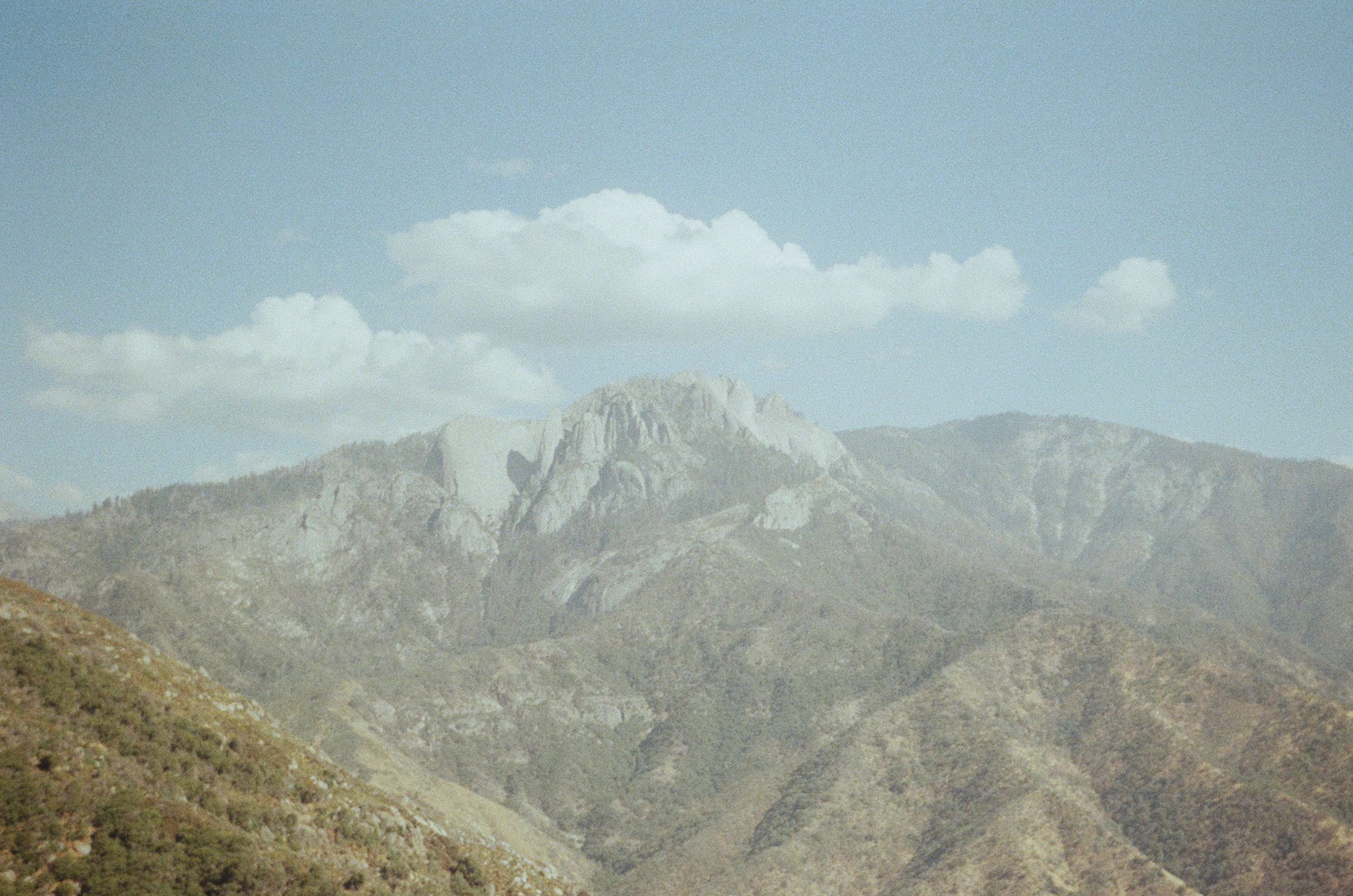A view of a mountain range from a distance