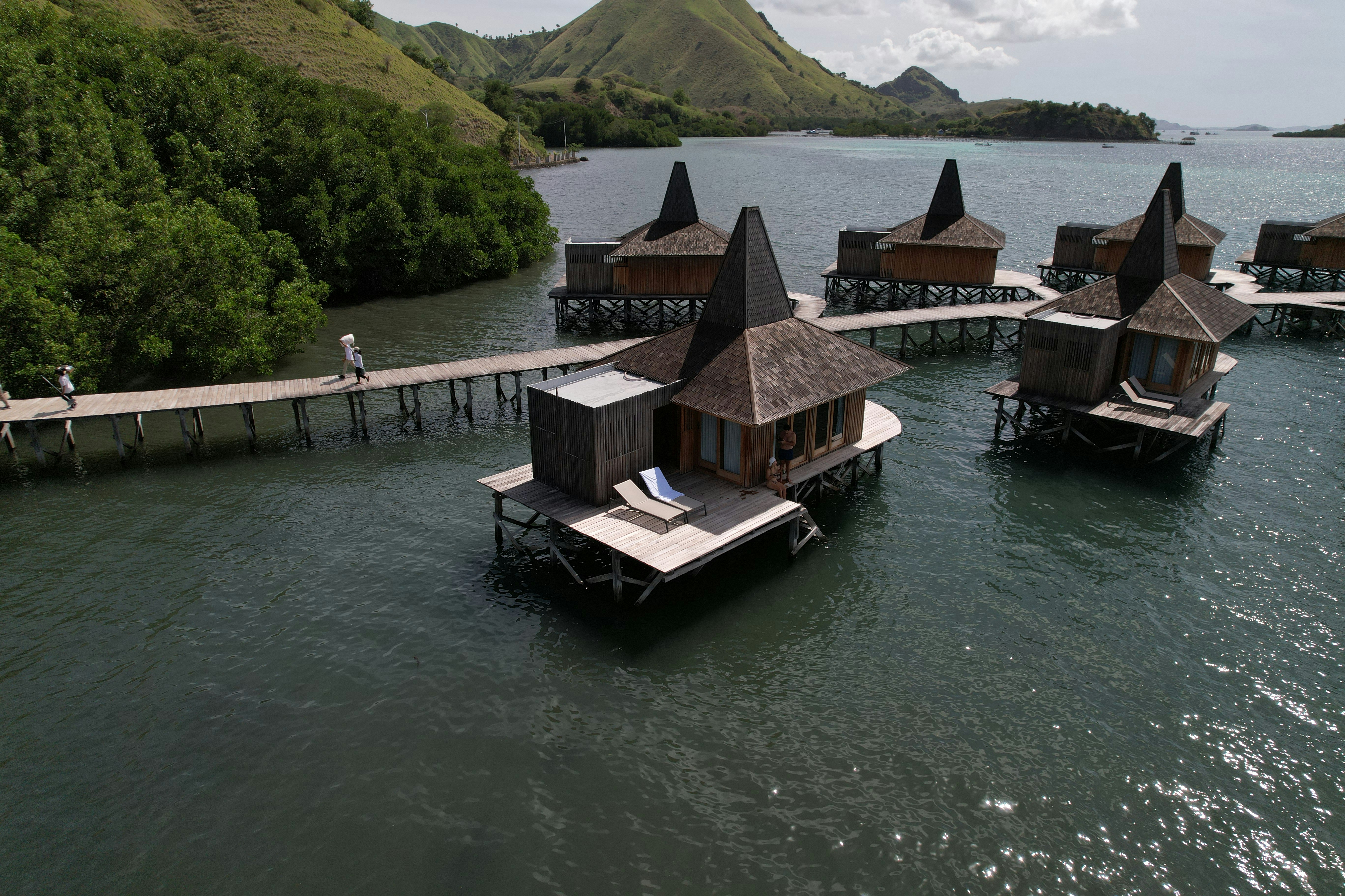 Floating luxury huts over crystal clear water