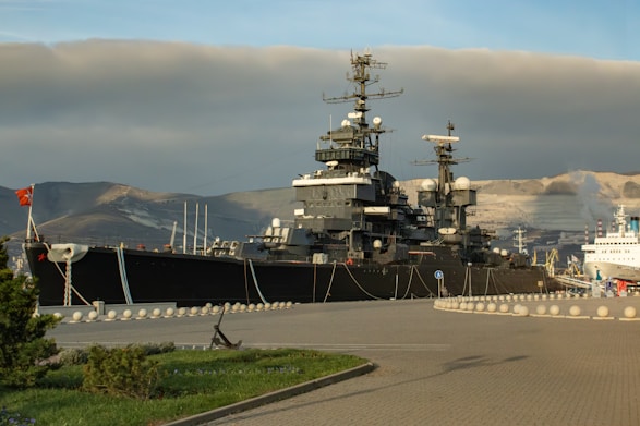 A couple of ships that are sitting in the water
