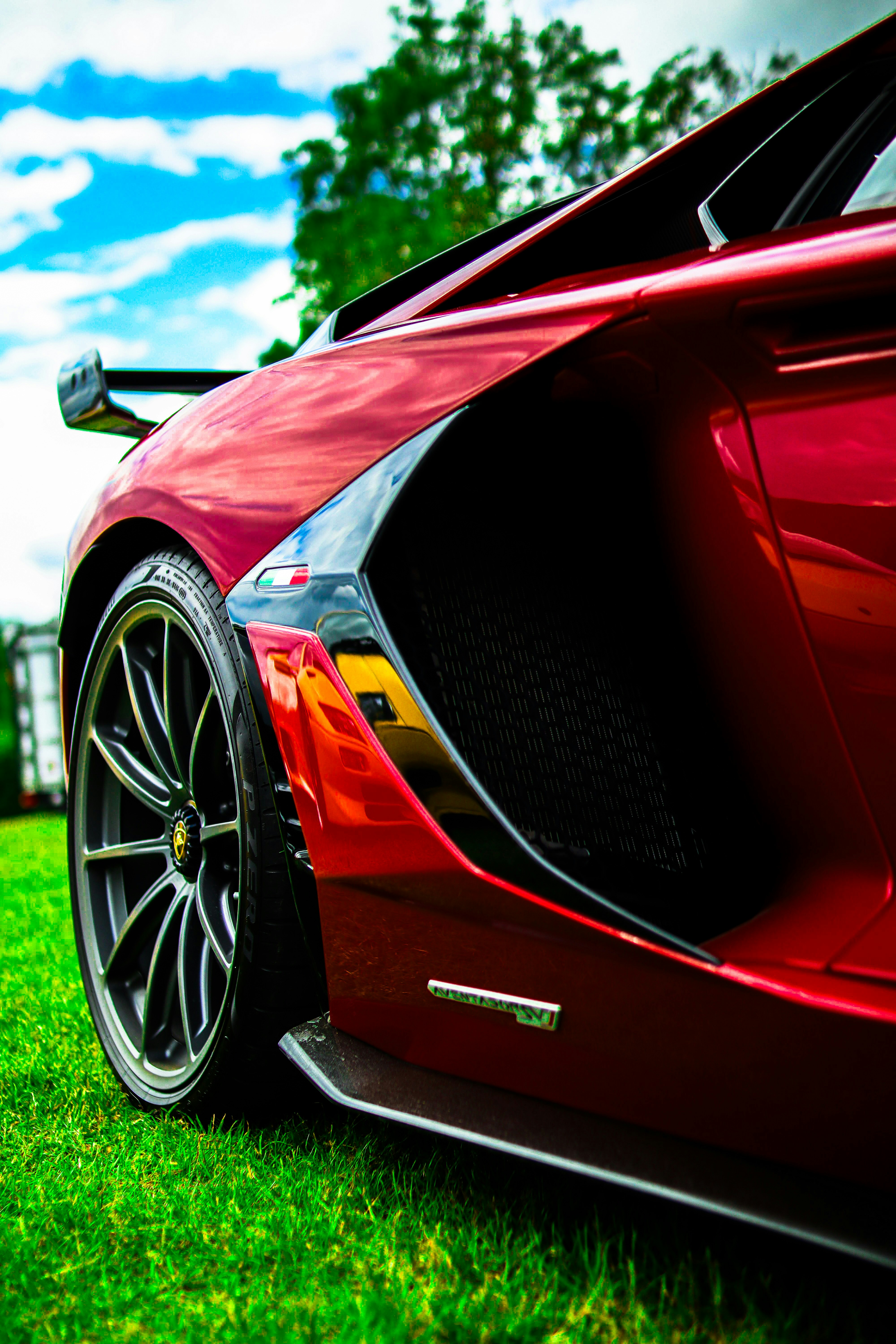 woman wearing yellow long-sleeved dress under white clouds and blue sky during daytime