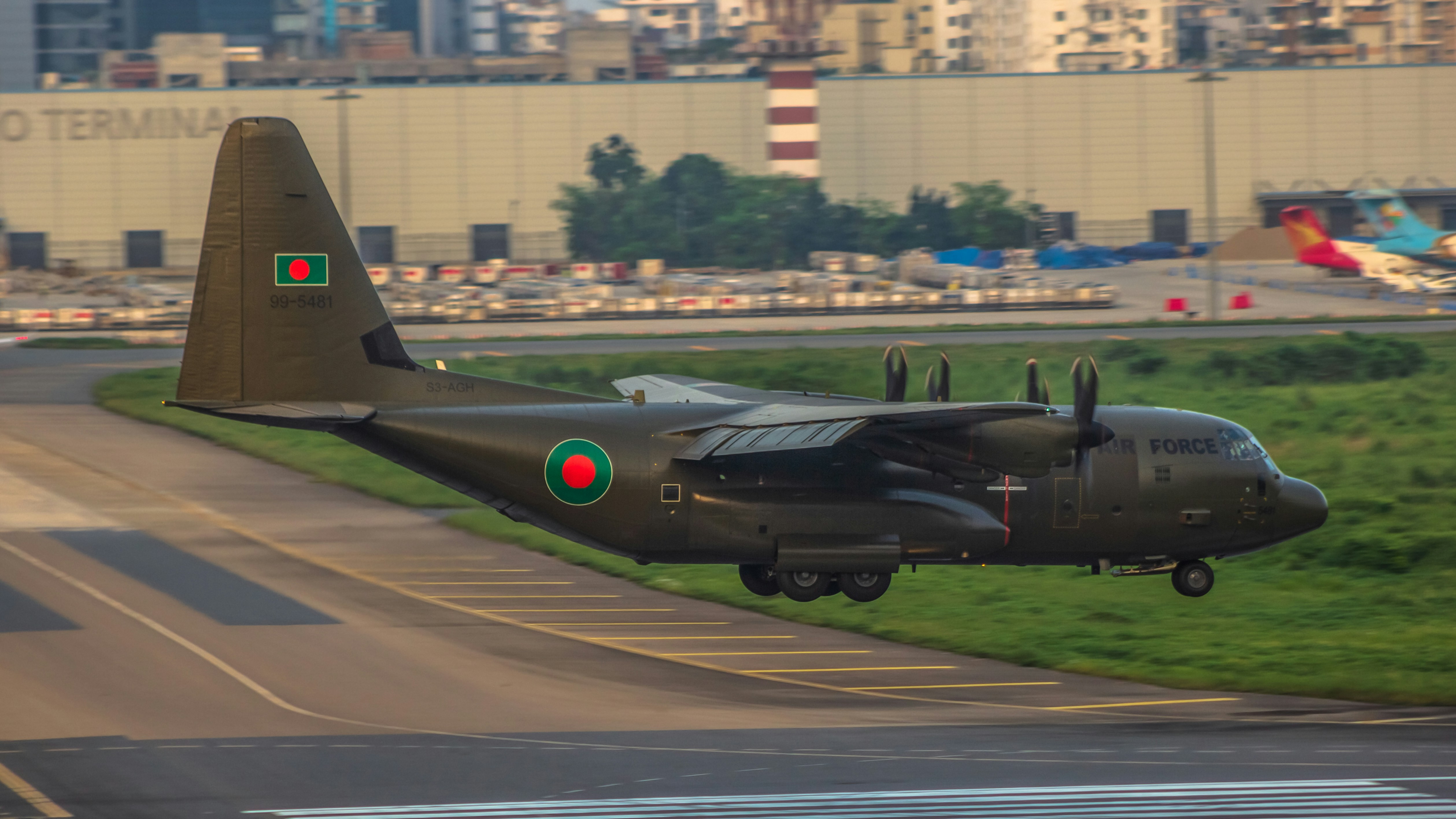A small airplane taking off from an airport runway