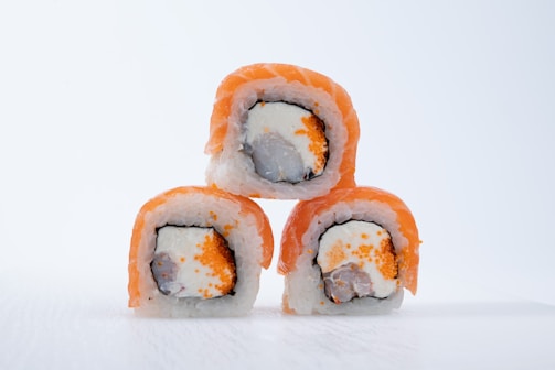 Four pieces of sushi stacked on top of each other
