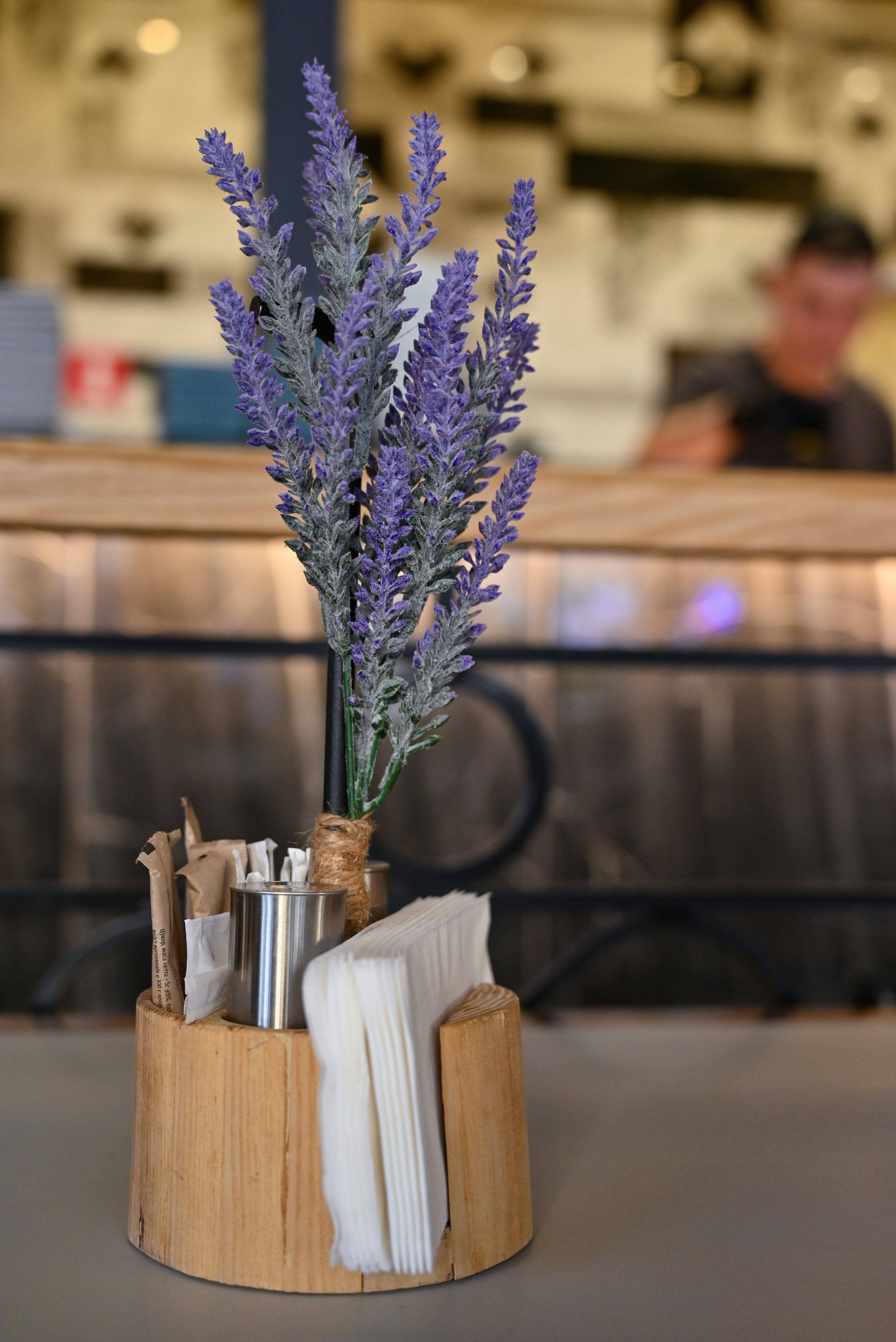 A vase with a bunch of purple flowers in it