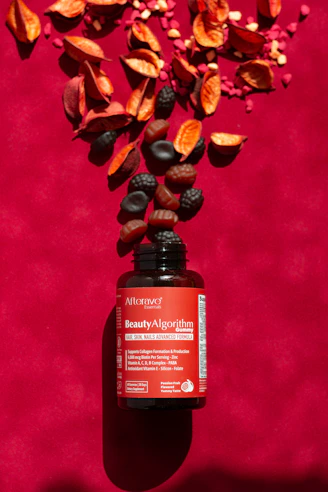 A bottle of vitamin supplement sitting on top of a table